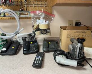 Old Sony and Panasonic answering machines. Old powered drill and scroll saw. Even a bag 'O tape.