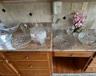 Crystal serving dishes and vases.