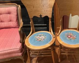 Vintage embroidered oak chairs.