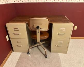 Two 2 drawer file cabinets and wooden top.