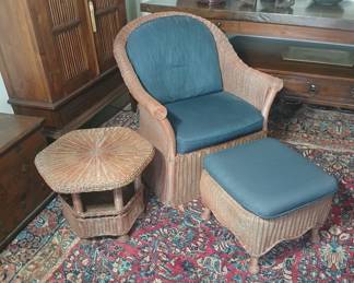This stunning vintage wicker lounge set was also part of the commercial contract furnishings commissioned by our clients' father for one of his several local resort hotel projects. Hand crafted, in excellent condition, with the added benefit of being built to commercial grade specifications! Chair is 29x30x32, seat at 16. Foot stool is 19x14, small side table, 21x16. $360. (Also available without the table.)