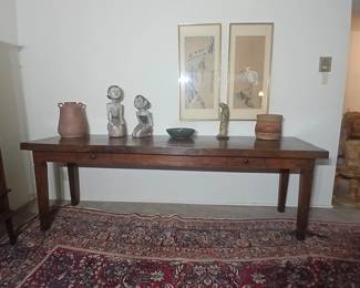 Nothing screams "old world" quite like an 8 foot sofa table with a top that's a single slab of Teak! Also custom made for our clients' parents by Indonesian artisans in the early 90s. 96x28x30, the top is a full 2.5 inches thick. $2,400.
