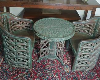 THE most astounding pieces of the entire collection. Purchased by our clients' parents while on one of their many shopping excursions around Indonesia in the early 90s. Looks like copper, but it's actually hand carved Teak with a pickled finish! The craftsmanship, the design acumen, and absolute attention to detail that went into the making of this set, is off the charts! The table is 28x27, and includes a round glass insert. The chairs are 25x25x33, seat at 16. $2,500.