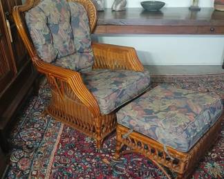 This HUGE, comfy vintage rattan club chair and ottoman, were both custom made to our clients' father's design and specifications! The cushions are covered in moisture resistant indoor / outdoor (undercover) Sunbrella fabric. All in excellent condition. Chair is 30x40x42, seat at 16. Ottoman is 25x20x16. $500.