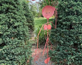 Interesting Red Metal Lady