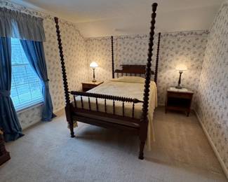 Bed frame, mattress & two night stands. Bed size is a 3/4, close to a full size bed. $700