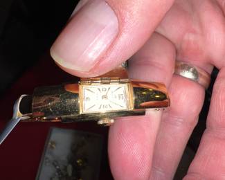 Gold Colored Watch with Hidden Face