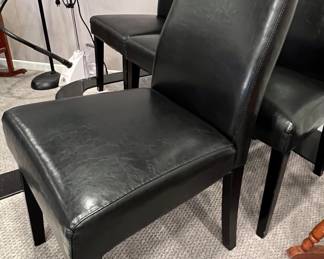 21. Set of 4 Black Faux Leather Chairs (18" x 19" x 40")