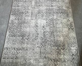 11. Bound Rug (5' x 7')