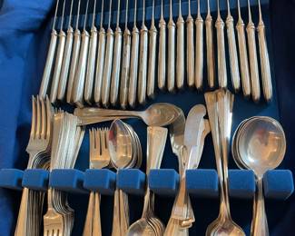 106. 147 Piece RM & S Sterling Flatware Service. Includes: 12 Dinner Forks, 14 Lunch Forks, 15 Cake Forks, !2 Dinner Knives,
12 Lunch Knives, 14 Butter Knives, 24 Teaspoons, 8 Soup Spoons, 12 Ice Tea Spoons, 6 Grapefruit Spoons,
2 Pickle Forks, 3 Serving Spoons, 1 Special Butter Knife, 3 Serving Forks, 4 Condiment Spoons, 1 Tomato Spoon,
2 Perforated Spoons, 1 Ice Tong, 1 Pie Knife