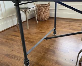 A98 - $1250. Restoration Hardware Flatiron Dining Table. Includes 6 chairs. Measures 39.5" x 84" x 30" tall. Overall good condition and very sturdy. There are a few water marks on the top and one where they sanded it out a bit. Part of the RH charm!