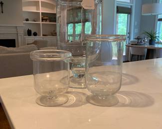 A97 - $15. Set of 3 Glass Vases at different heights.