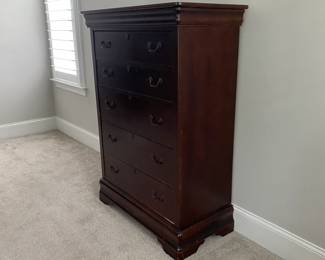 A23 - $60. Bassett Chest of Drawers. AS IS. Bottom Drawer needs repair. Measures 39.25" wide x 20" deep x 55" tall.
