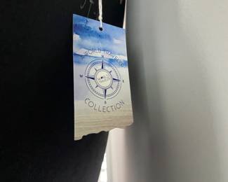 A24 - $30. "A World Traveler Collection" Brand Mirror. Measures 26" across.