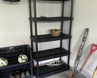 A64 - $40. Black Plastic Shelf Rack.