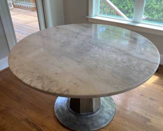 A6 - $450. Haverty's "Emory" Marble Top Table. Measures 52" round x 30.5" tall. You will need 2 strong people to move the marble and I suggest you take it apart.