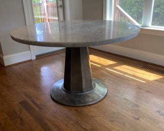 A6 - $450. Haverty's "Emory" Marble Top Table. Measures 52" round x 30.5" tall. You will need 2 strong people to move the marble and I suggest you take it apart.
