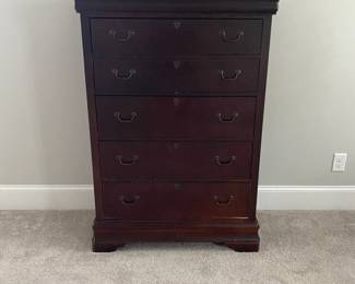 A23 - $60. Bassett Chest of Drawers. AS IS. Bottom Drawer needs repair. Measures 39.25" wide x 20" deep x 55" tall.