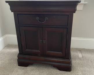 A27 - $40. Single Basset Nightstand. Measures 26.5" wide x 17" deep x 29" tall. Drawer Slides - top has water marks in one area.