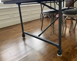 A98 - $1250. Restoration Hardware Flatiron Dining Table. Includes 6 chairs. Measures 39.5" x 84" x 30" tall. Overall good condition and very sturdy. There are a few water marks on the top and one where they sanded it out a bit. Part of the RH charm!