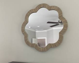 A24 - $30. "A World Traveler Collection" Brand Mirror. Measures 26" across.
