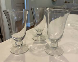 A96 - $10. 3 Pc Matching Glass Vases. 8" tall.