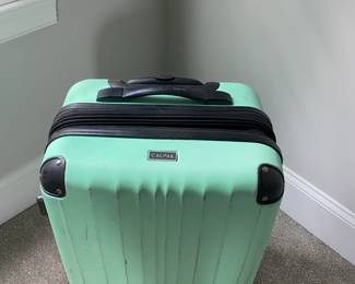 A31 - $40. Calpak 4 swivel wheel hardcase luggage. Has been used but still works!