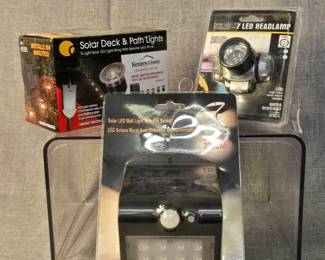 Different Solar Lights And A LED Headlamp