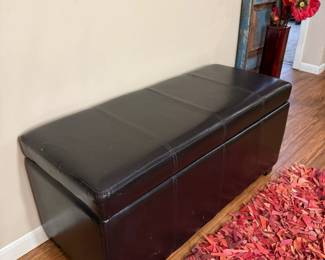 69 LOT. Black Faux Leather Storage Ottoman