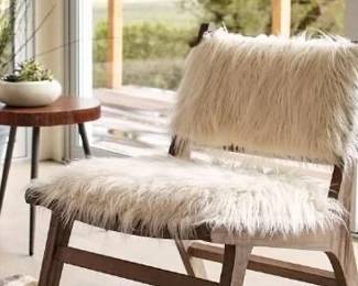 137 LOT. World Market White Faux Fur Chair