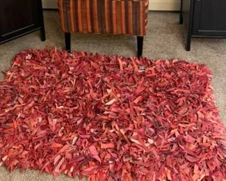 281 LOT. Safavieh Red Leather Shag Accent Rug