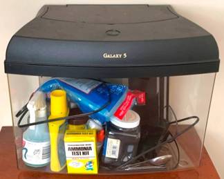 233 - Fish Tank & Contents - 13" x 16" x 9" You are buying a used as-is electric/electronic item. We do not guarantee all components are present, and if it is not expressly stated, it is untested.