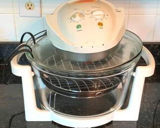 135 - FlavorWave Turbo Oven - 14" x 16" You are buying a used as-is electric/electronic item. We do not guarantee all components are present, and if it is not expressly stated, it is untested.