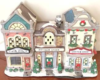 226 - Lighted Christmas Stores - 9" x 14" x 6" You are buying a used as-is electric/electronic item. We do not guarantee all components are present, and if it is not expressly stated, it is untested.
