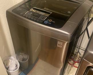 LG top load stainless steel washing machine machine runs great