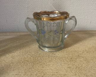 Vintage blue glass creamer with gold rim