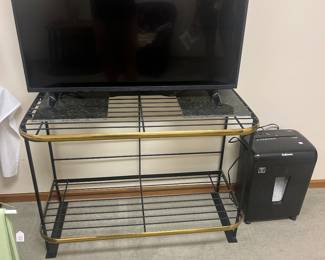 Flatscreen television, television, stand, and paper shredder
