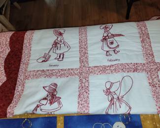 Quilted and embroidered lap covers and wall hangings.