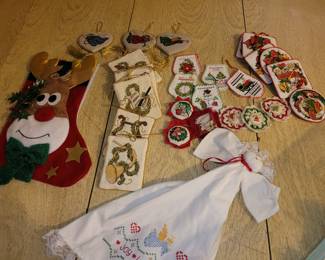 Several tubs of Christmas decorations.