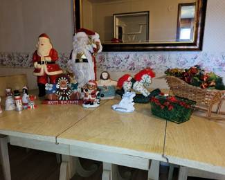 Several tubs of Christmas decorations.