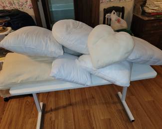 Various sizes of throw pillows. (Covers sold separately.)