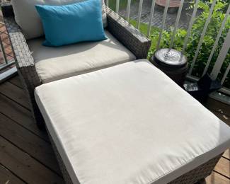 Outdoor chair and ottoman. Second set of cushion covers included.