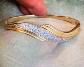 14 karat gold bangle with diamonds