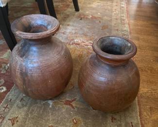 Two vintage hand carved wooden pots