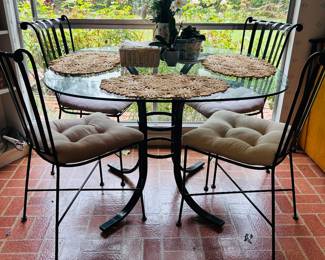 Nice glass breakfast table with 5 chairs (only 4 shown in photo).