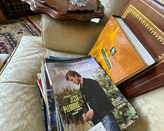 Magazines, books, occasional table, photo albums