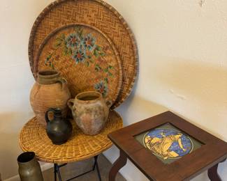 Two more tables, vessels, pottery, painted wicker basket