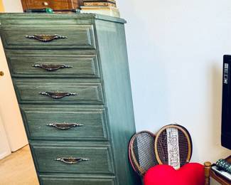 Tall chest, vintage racquets