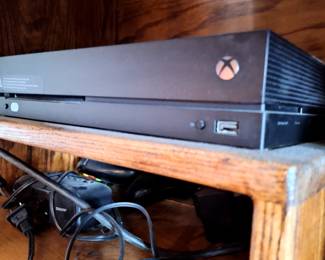 2 Xbox One 360 consoles, games and 2 wireless controllers.