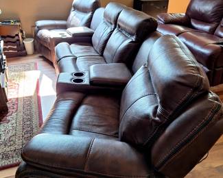 Lovely home theater sectional with 4 recliners 